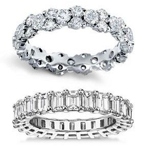 Two diamond infinity bands, both in white gold.